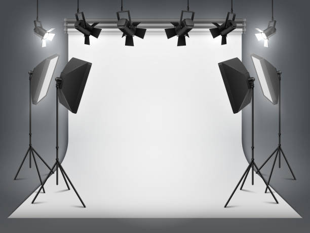istock Photography studio. Photo backdrop and spotlight, realistic floodlight with tripod and studio equipment. Vector studio background 1147610566