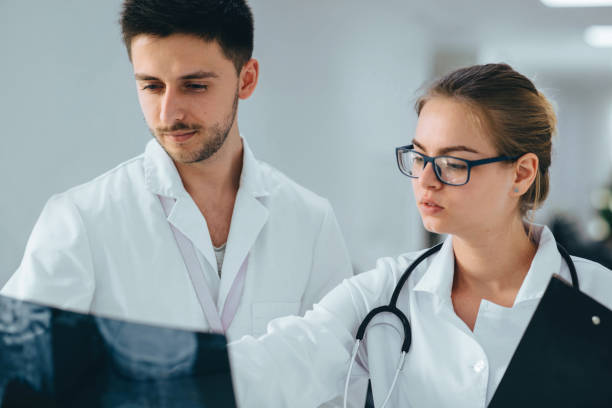 istock group of medical students practising at clinic 1147613048