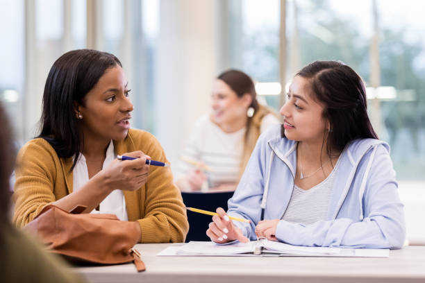 istock African American adult tutor answers question 1147615928