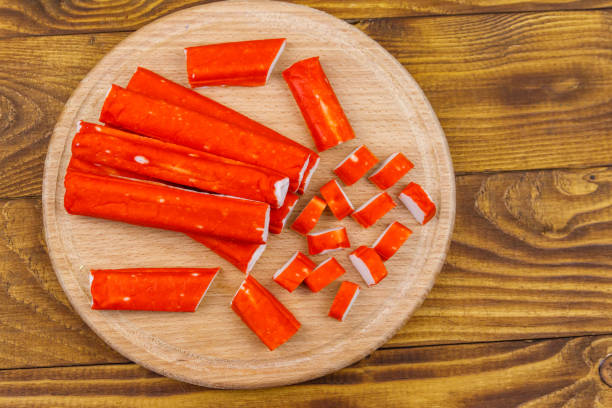 istock Crab sticks on cutting board on wooden table 1147617327