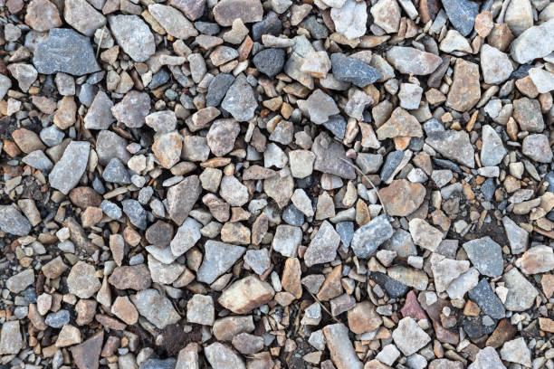pattern of crushed stones and gravel. abstract background texture for wallpaper. - stacking stone rock full imagens e fotografias de stock