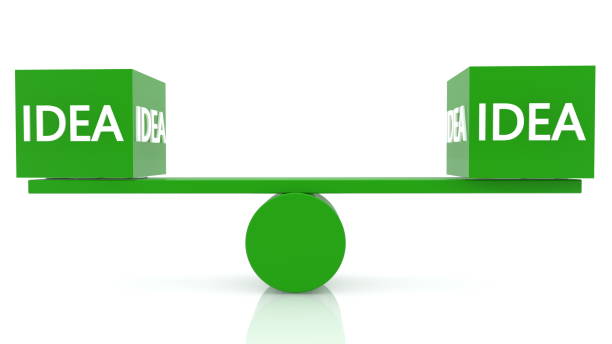 istock Seesaw balance with idea concept in green color 1147626749