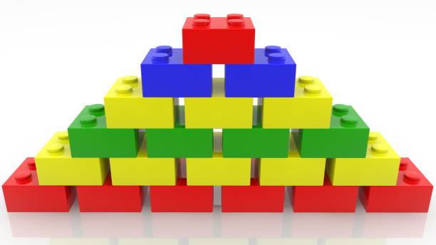istock Pyramid of colorful toy bricks on white 1147626794