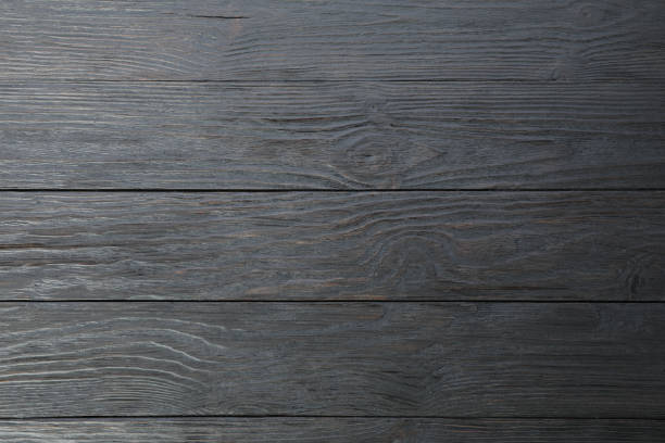 istock Dark wooden background. Space for text, top view 1147628993