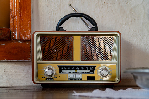 Wood Retro broadcast table radio receiver .