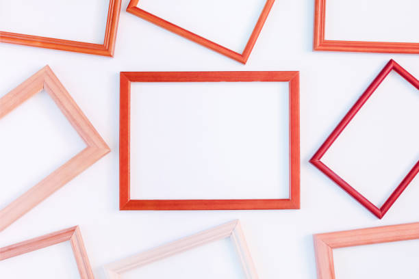 istock On a white background many red empty frames are laid out. Space for text, layout. Unusual concept. 1147632835