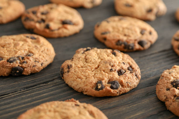 istock Chocolate chip cookies on wooden background 1147633090