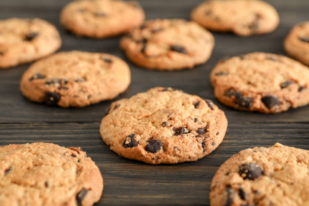 istock Chocolate chip cookies on wooden background 1147633139