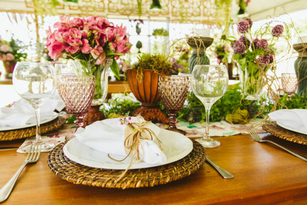 istock Wedding Setup. Banquet with table and chairs. Decoration, flowers, ware, glass 1147634447