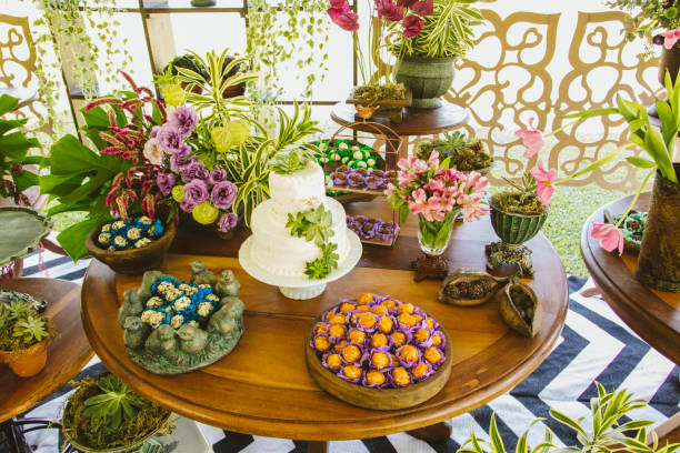 istock Wedding Setup. Cake tables with sweet, decoration and flowers 1147634454