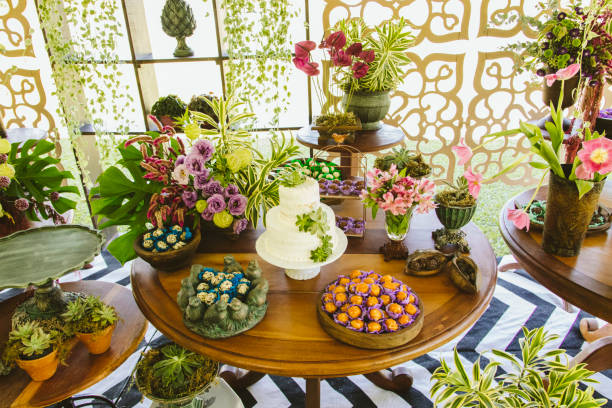 istock Wedding Setup. Cake tables with sweet, decoration and flowers 1147634499