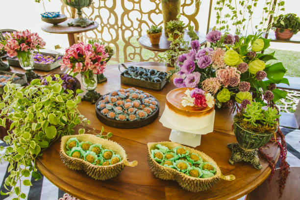istock Wedding Setup. Cake tables with sweet, decoration and flowers 1147634550