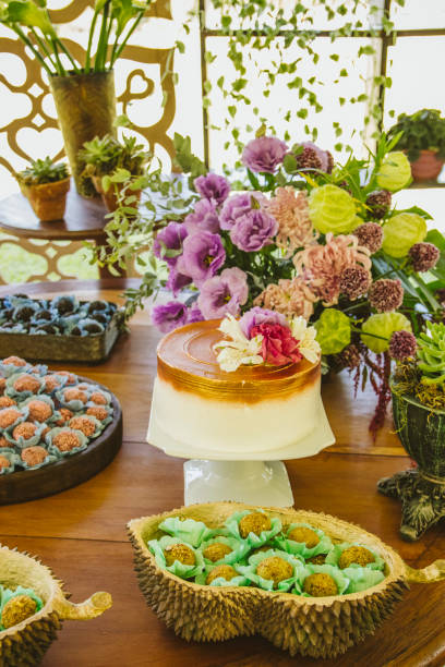 istock Wedding Setup. Cake tables with sweet, decoration and flowers 1147634610