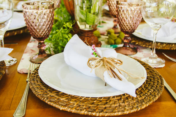 istock Wedding Setup. Banquet with table and chairs. Decoration, flowers, ware, glass 1147634788