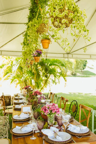 istock Wedding Setup. Banquet with table and chairs. Decoration, flowers, ware, glass 1147635581