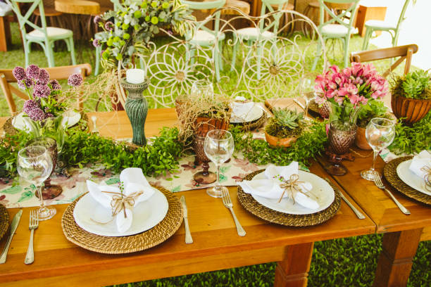 istock Wedding Setup. Banquet with table and chairs. Decoration, flowers, ware, glass 1147635601
