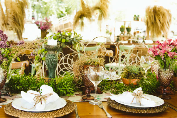 istock Wedding Setup. Banquet with table and chairs. Decoration, flowers, ware, glass 1147635747