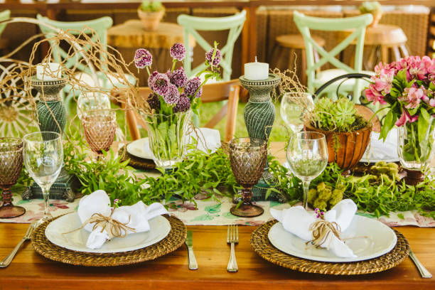istock Wedding Setup. Banquet with table and chairs. Decoration, flowers, ware, glass 1147635820