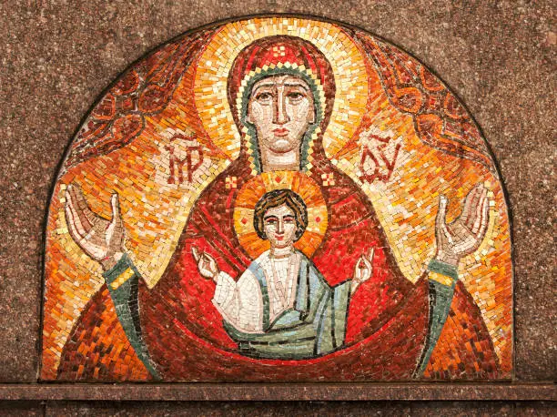 Mother of God with Jesus. Old ethno picture of stones (religion, Christianity, faith concept)