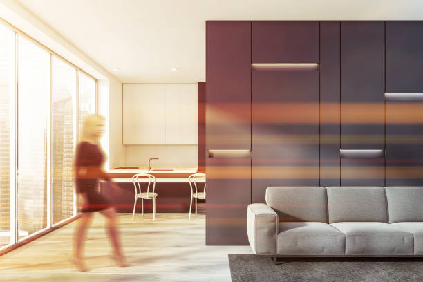 istock Woman walking in modern apartment 1147637008