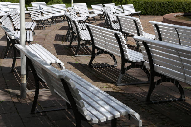 istock White benches on the concert stage at the Park 1147638174