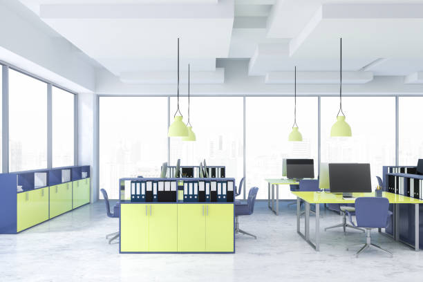 istock Blue and yellow office with bookcases 1147638181