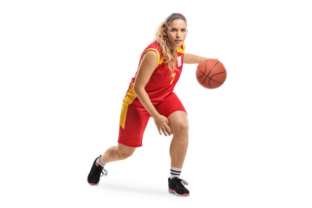 istock Female basketball player leading a ball 1147643294