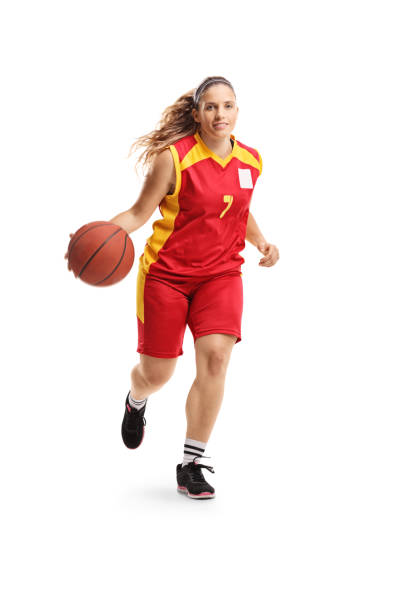 istock Female basketball player running with a ball 1147643295