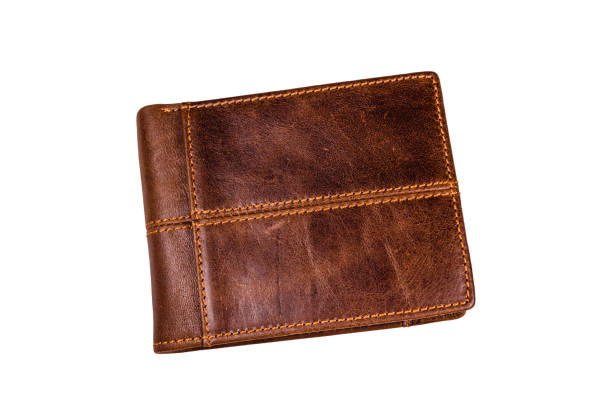 istock Closed brown leather wallet isolated on a white background 1147653243