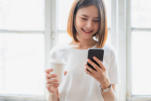 istock Woman using smartphone, During leisure time. The concept of using the phone is essential in everyday life. 1147653312
