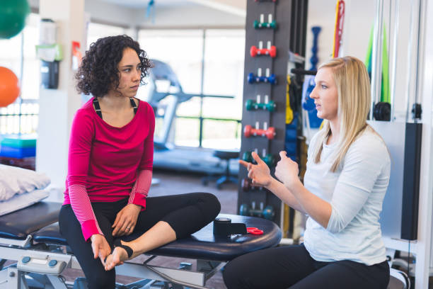 istock Two women in a physiotherapy clinic 1147656563