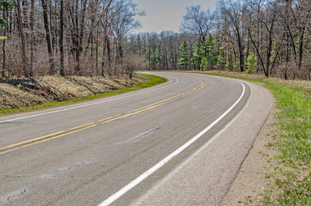 istock Double Yellow Line on a Road in Michigan 1147666396