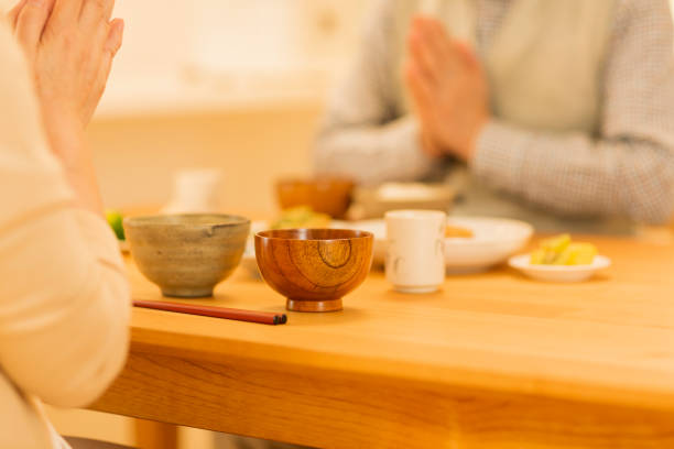 istock Senior couple eating dinner 1147672212