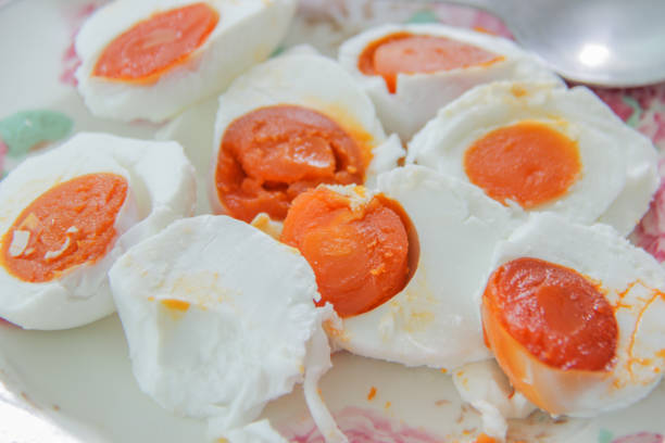 closeup salted egg duck on white plate