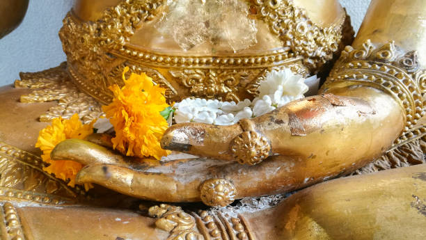 istock gold leaf texture on buddha statue, Thailand 1147673347