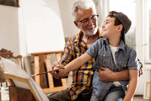 istock Painting together on canvas 1147676900