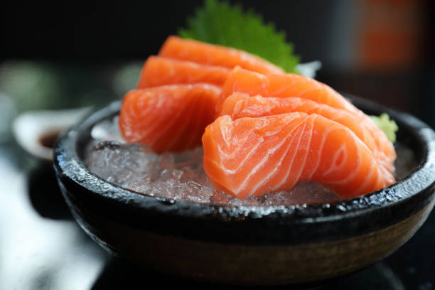 istock Salmon sashimi on ice Japanese food 1147685102