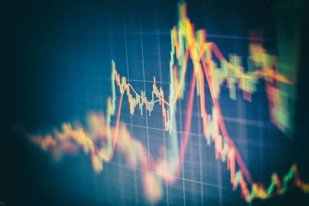 istock Technical price graph and indicator, red and green candlestick chart on blue theme screen, market volatility, up and down trend. Stock trading, crypto currency background. 1147693754