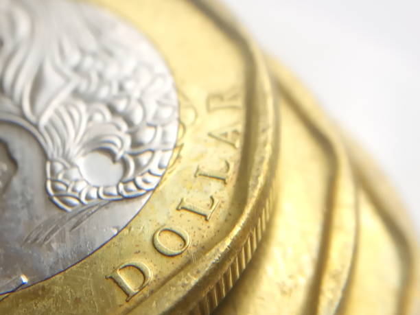 istock Conceptual Macro, stack of golden 1 singapore dollar 1147700726