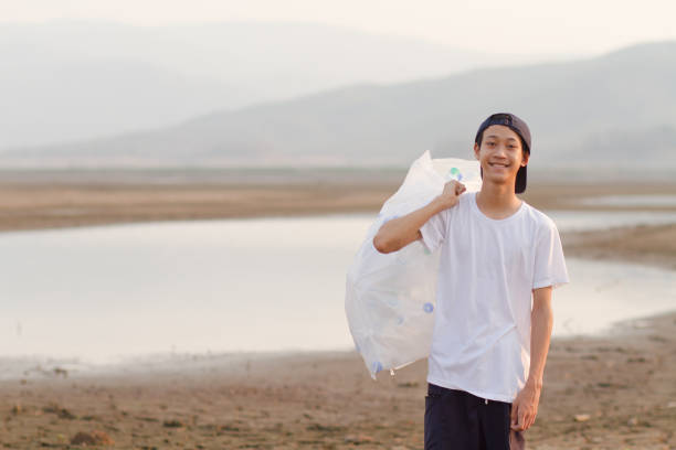 Young volunteer Save environment from plastic pollution