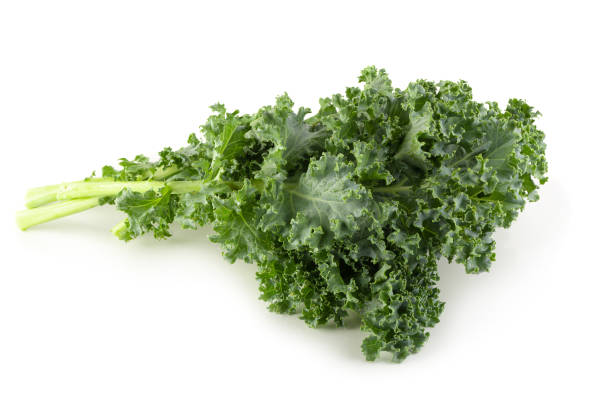 istock Fresh organic green kale leaves isolated over white background 1147707174