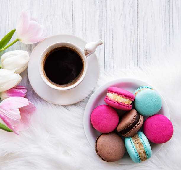istock Cup of coffee and macaroons 1147708514