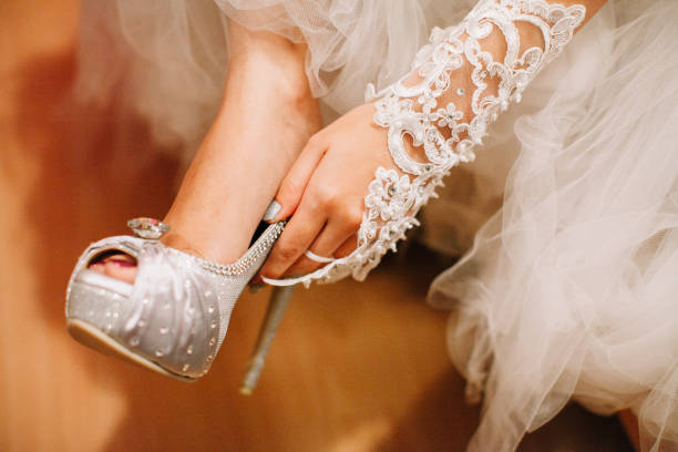 istock Bride wearing wedding heels on wedding day 1147709979
