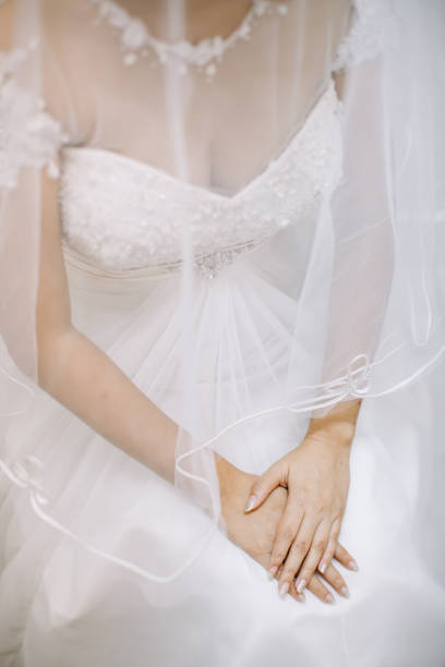 istock Bride dressed in white wedding gown waiting for bridegroom 1147710143