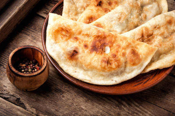 istock Cheburek,dough pie with meat filling 1147712513