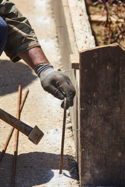 istock Worker during of a construction.Closeup view. 1147713660