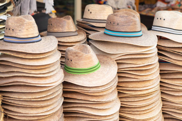istock Summer straw hats on the market 1147713843