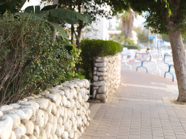 istock fence made of stones 1147717369
