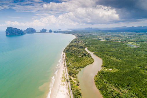 Aerial view wide shot beautiful landscape sunset tropical beach sea in south thailand Asia