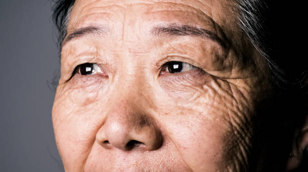 Senior asian woman eye Senior asian woman eye eye closeup stock pictures, royalty-free photos & images